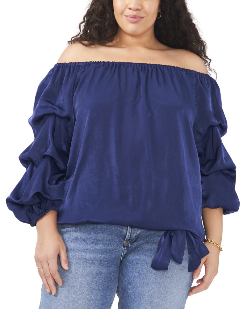 Front of a model wearing a size 1X Belinda Balloon SleeveTop in CLASSIC NAVY by Vince Camuto. | dia_product_style_image_id:261582